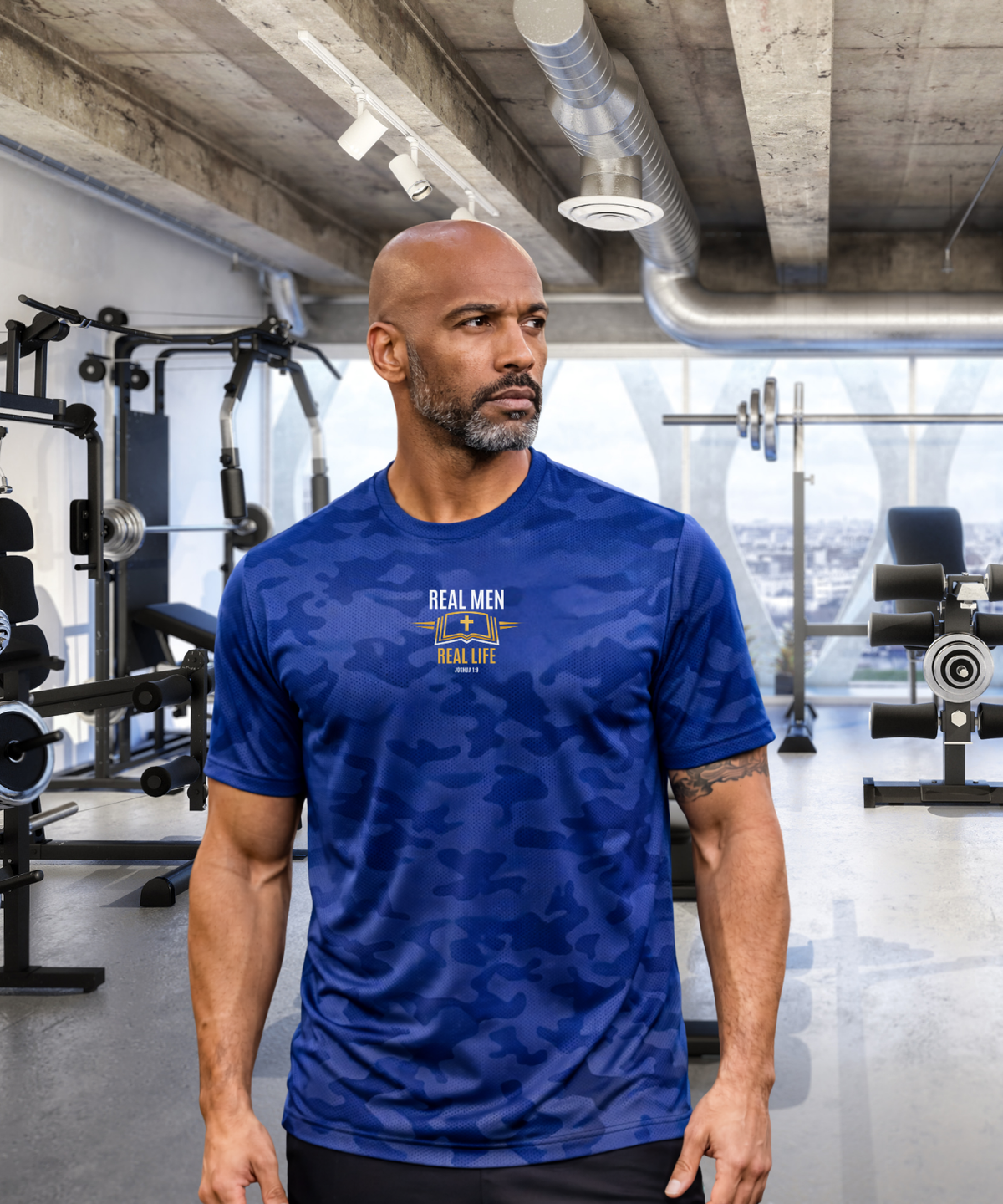 Man wearing RMRL Camo Dry-Fit Performance Tee in Deep Royal Blue camo with gold chest logo in a gym setting