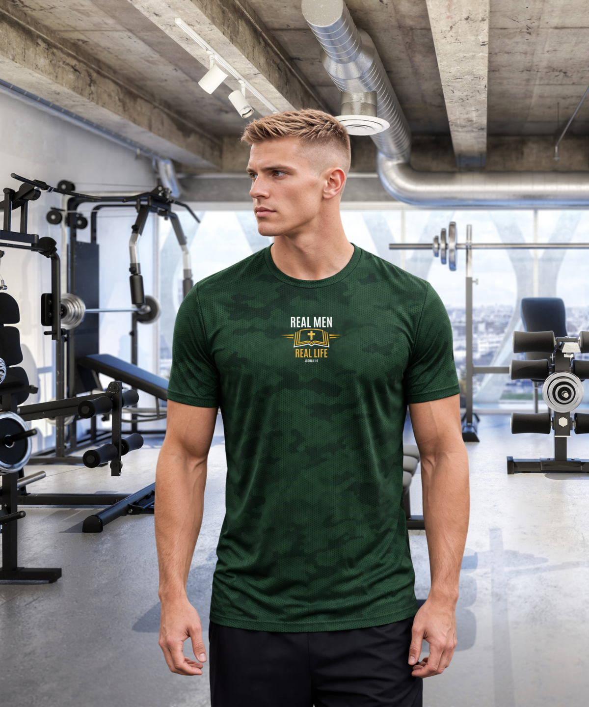 Focused man in modern gym wearing RMRL Emerald Green Camo Dry-Fit Tee with Real Men Real Life center-chest logo